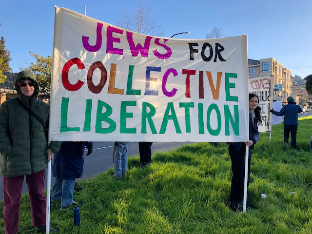 Jews for Collective Liberation -- photo showing a large banner that says this text in colorful uppercase